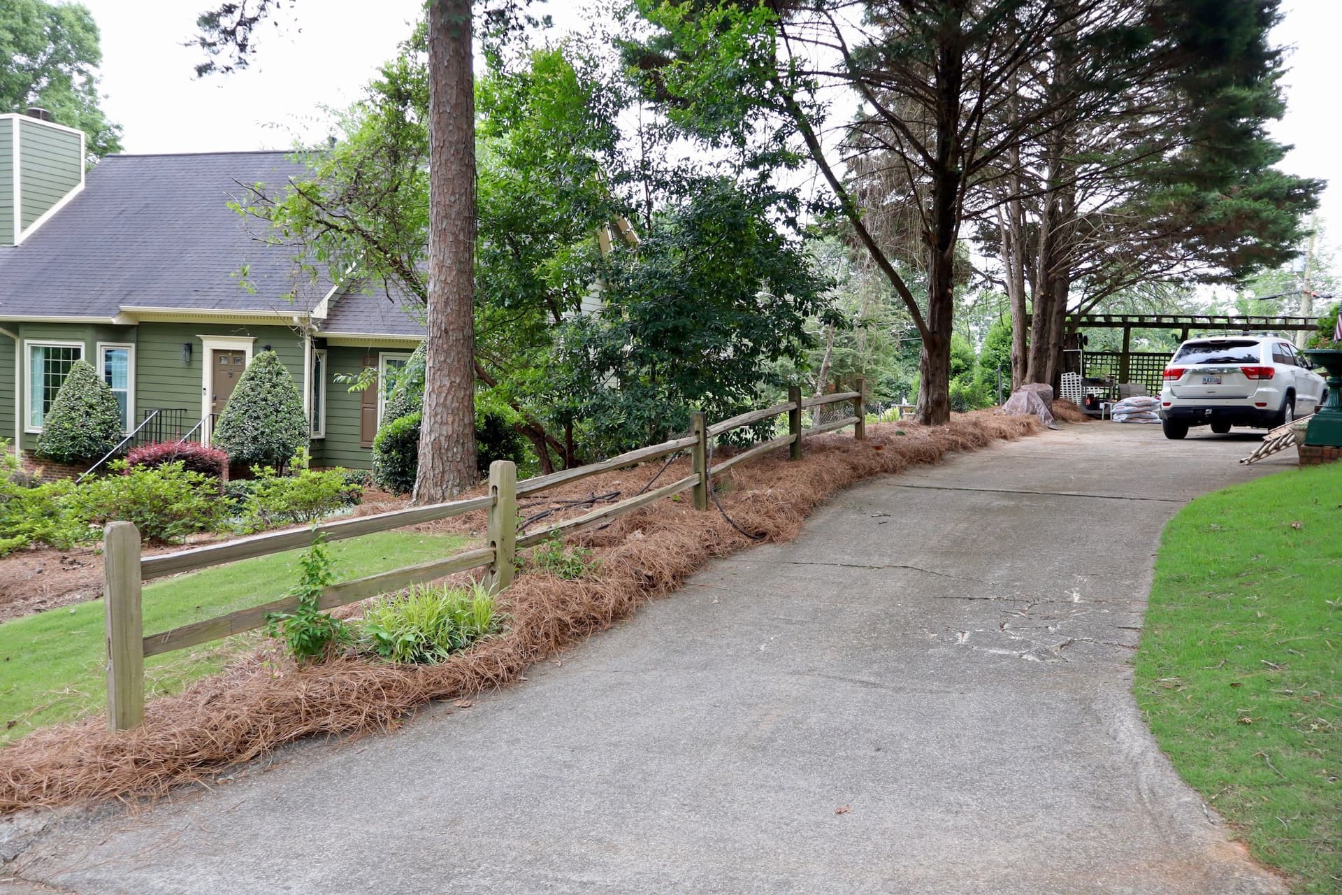 Gallery photos for 25 Junipers and Fresh Pine Straw Clean Up a Tough Slope: Image #2